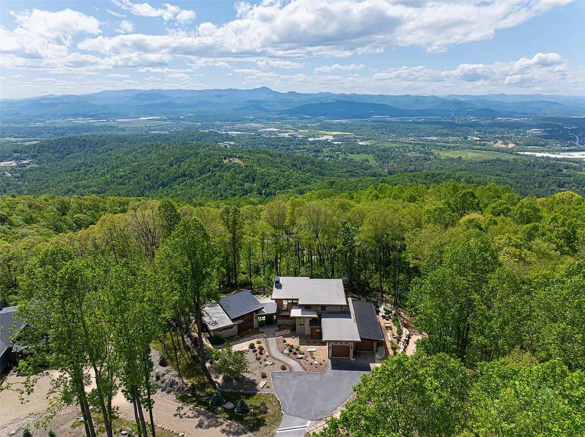 modern prairie style mountain house exterior aerial view