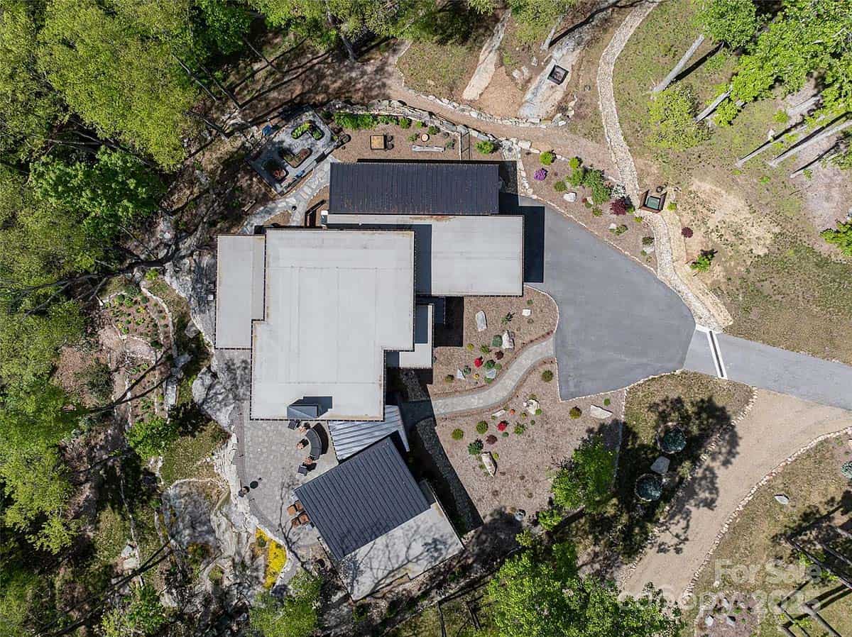 modern prairie style mountain house exterior aerial view