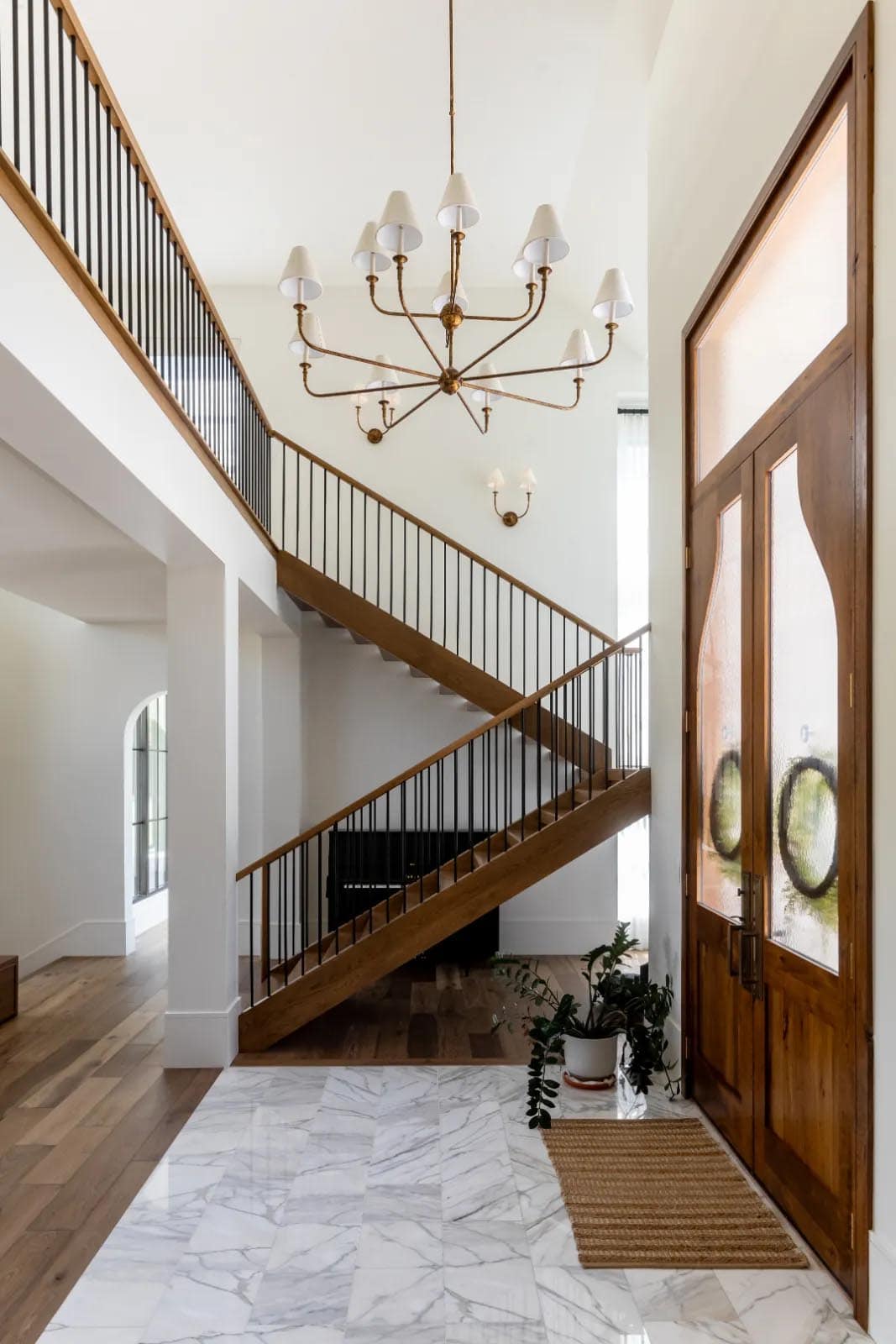 modern scandinavian style home entry with a staircase