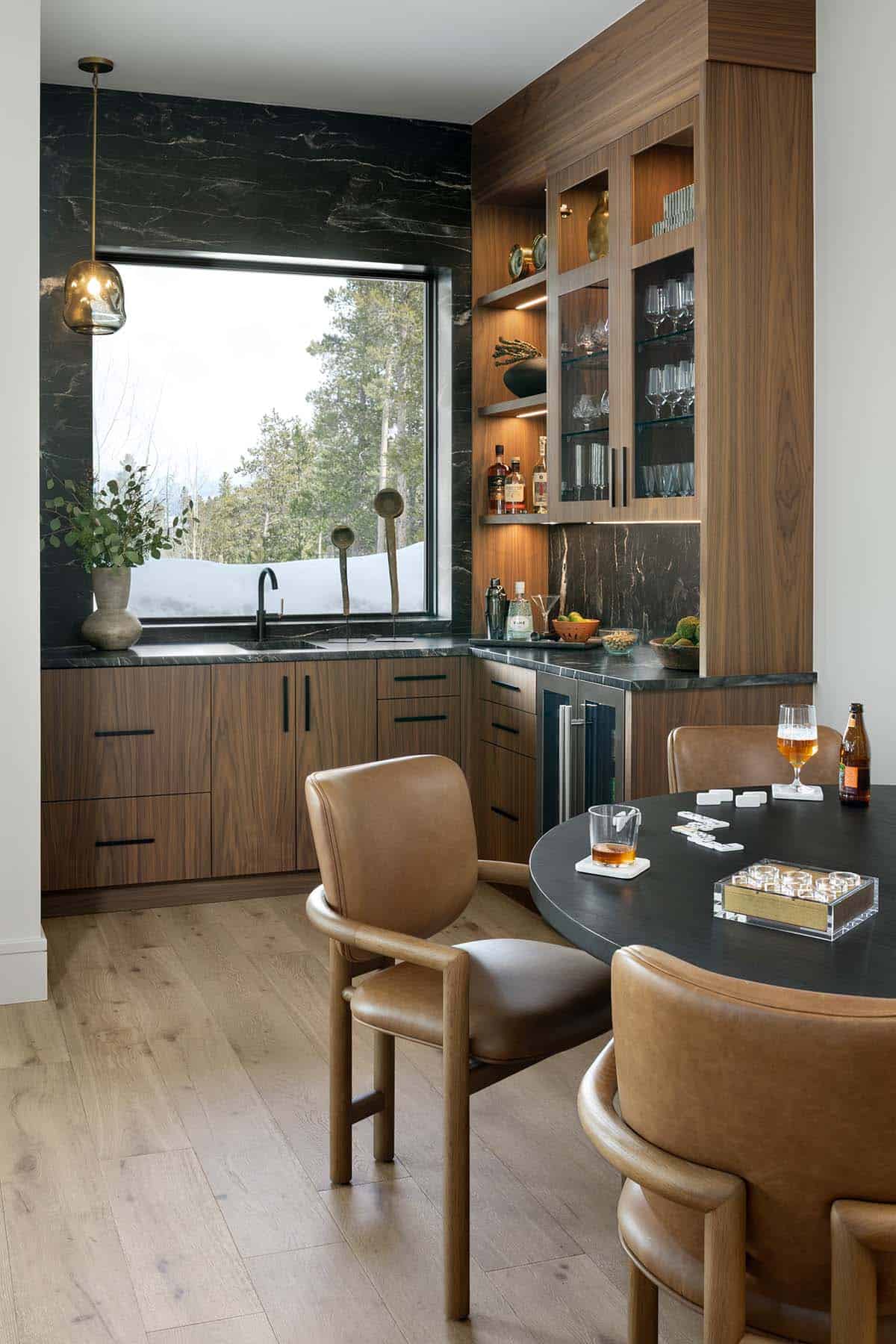 contemporary home bar with a card table