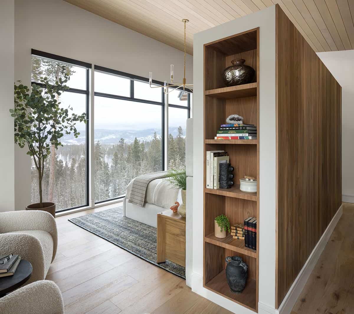 contemporary bedroom with large windows