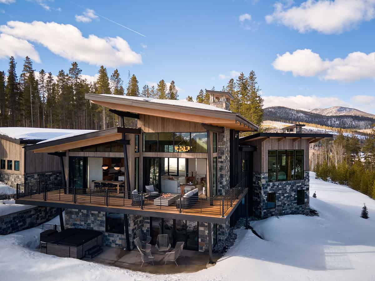 mountain contemporary home exterior with snow