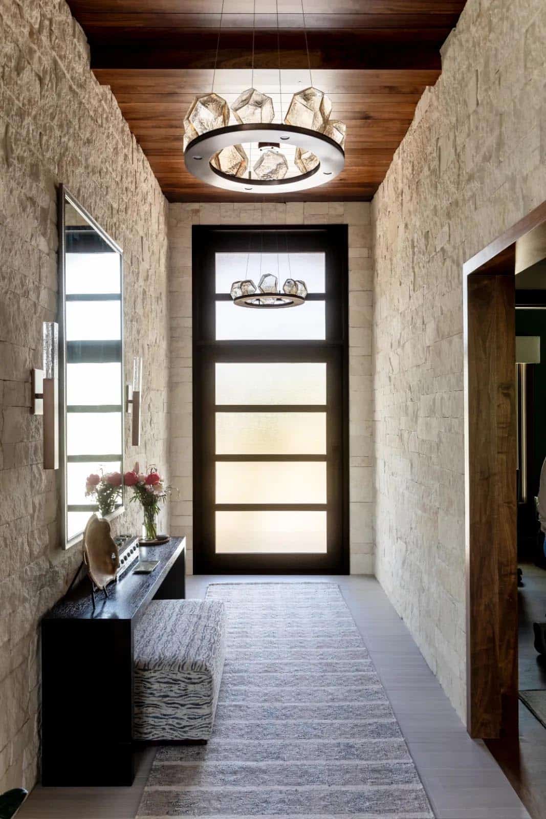 modern mountain home entry with a bench