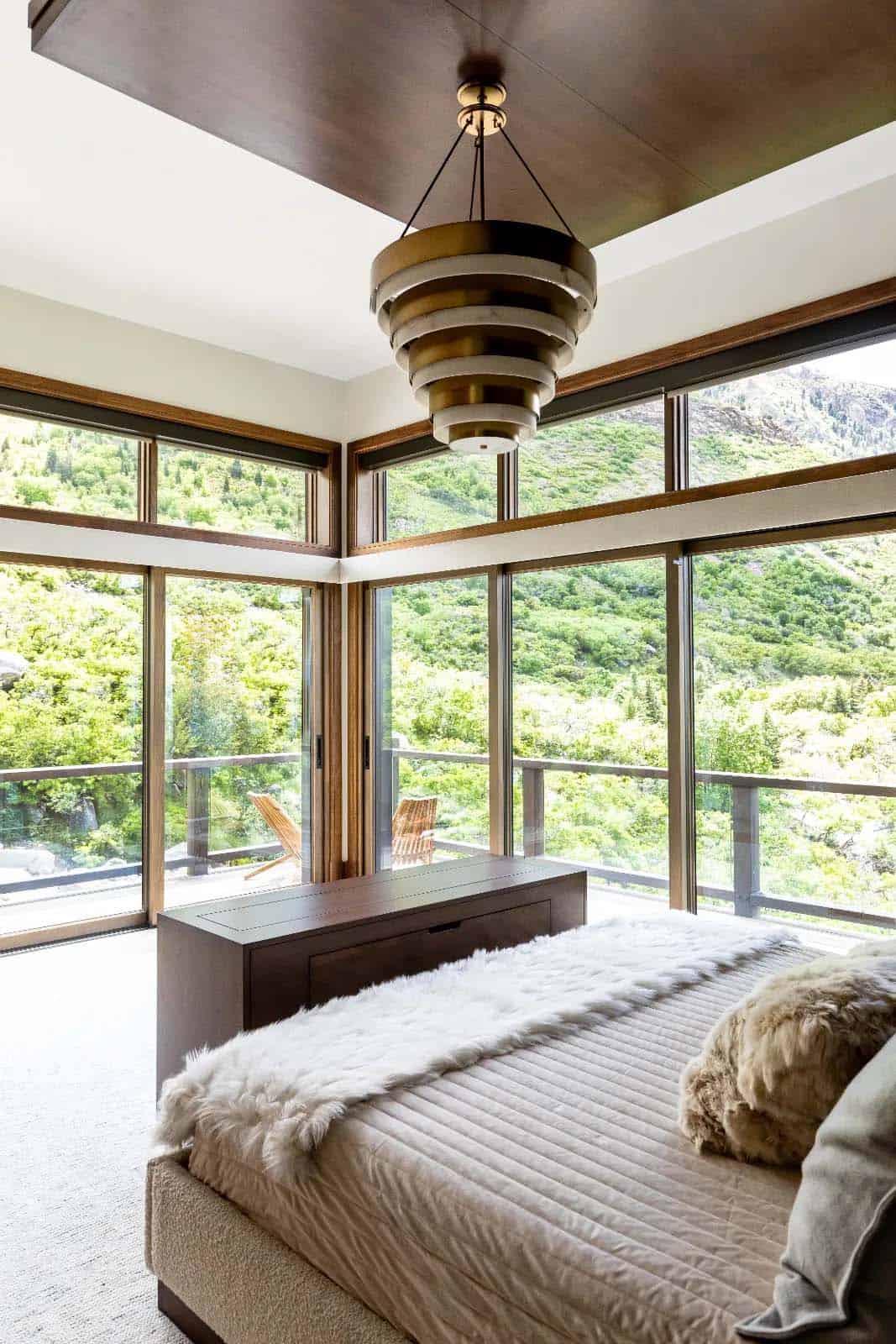 modern bedroom with floor-to-ceiling windows