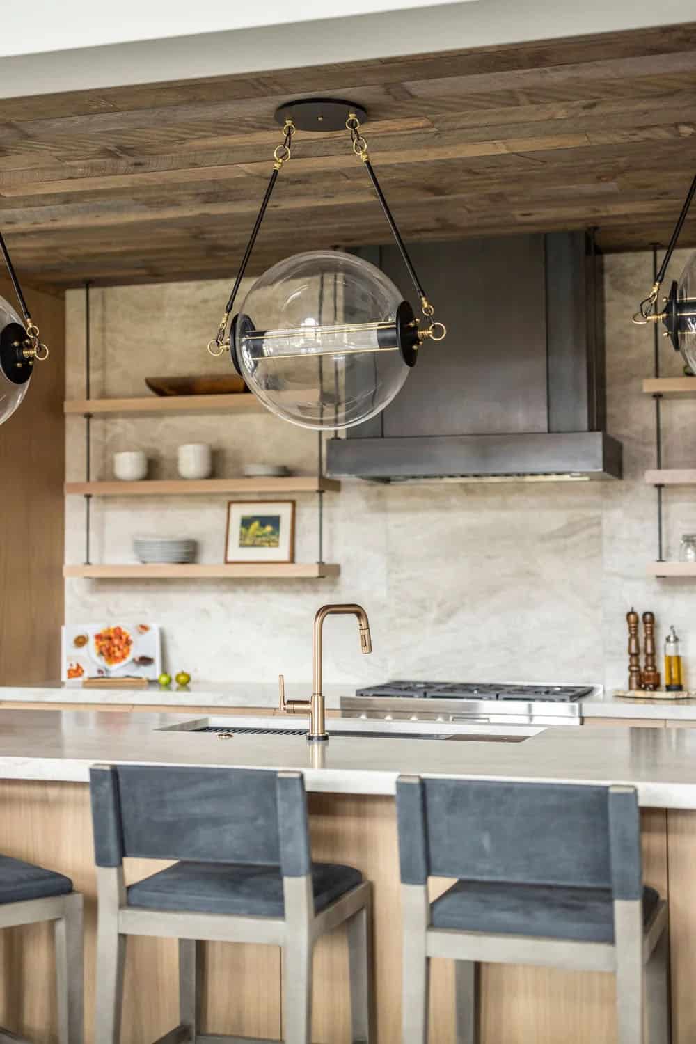 modern kitchen with a custom metal hood