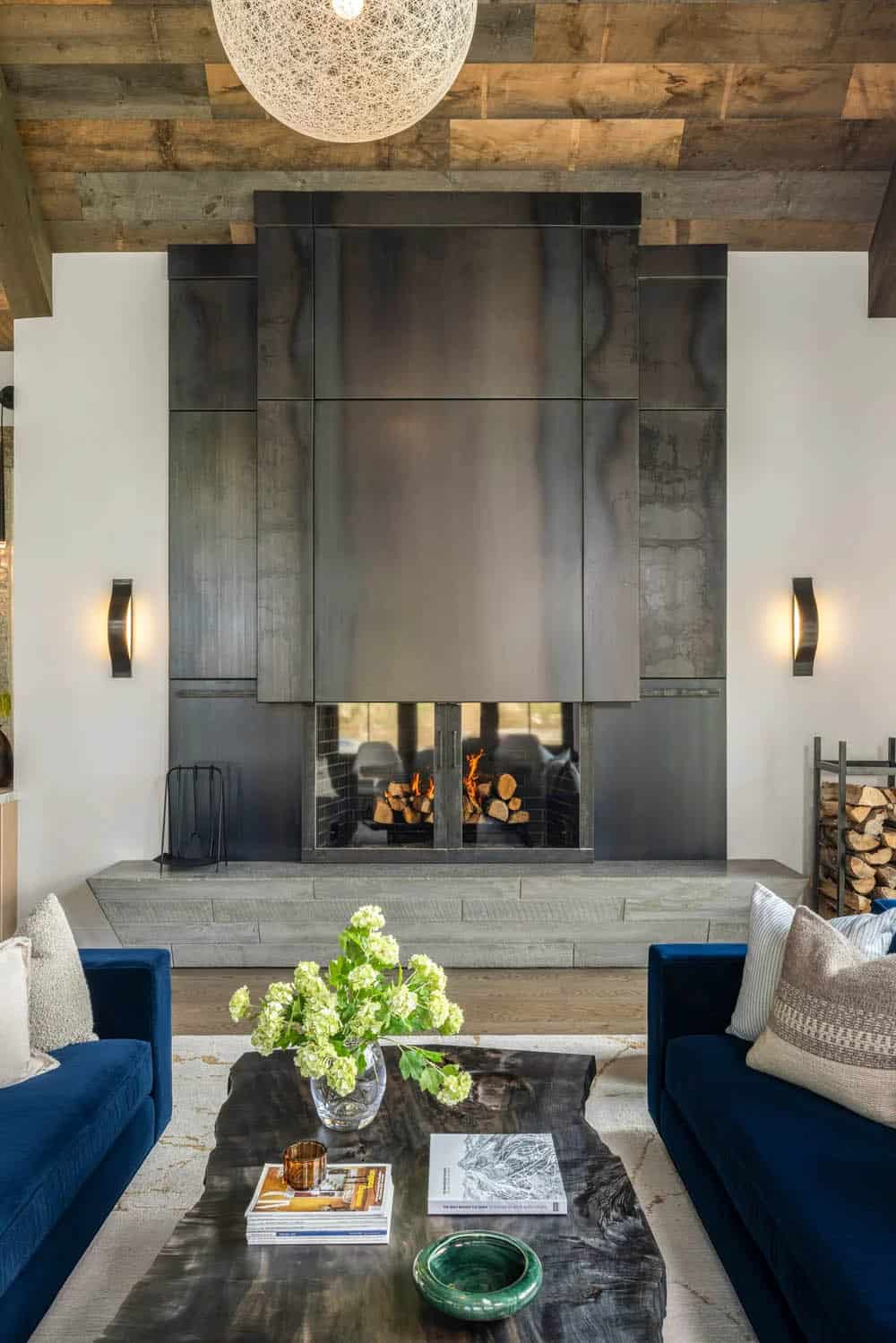 modern living room with a double sided fireplace