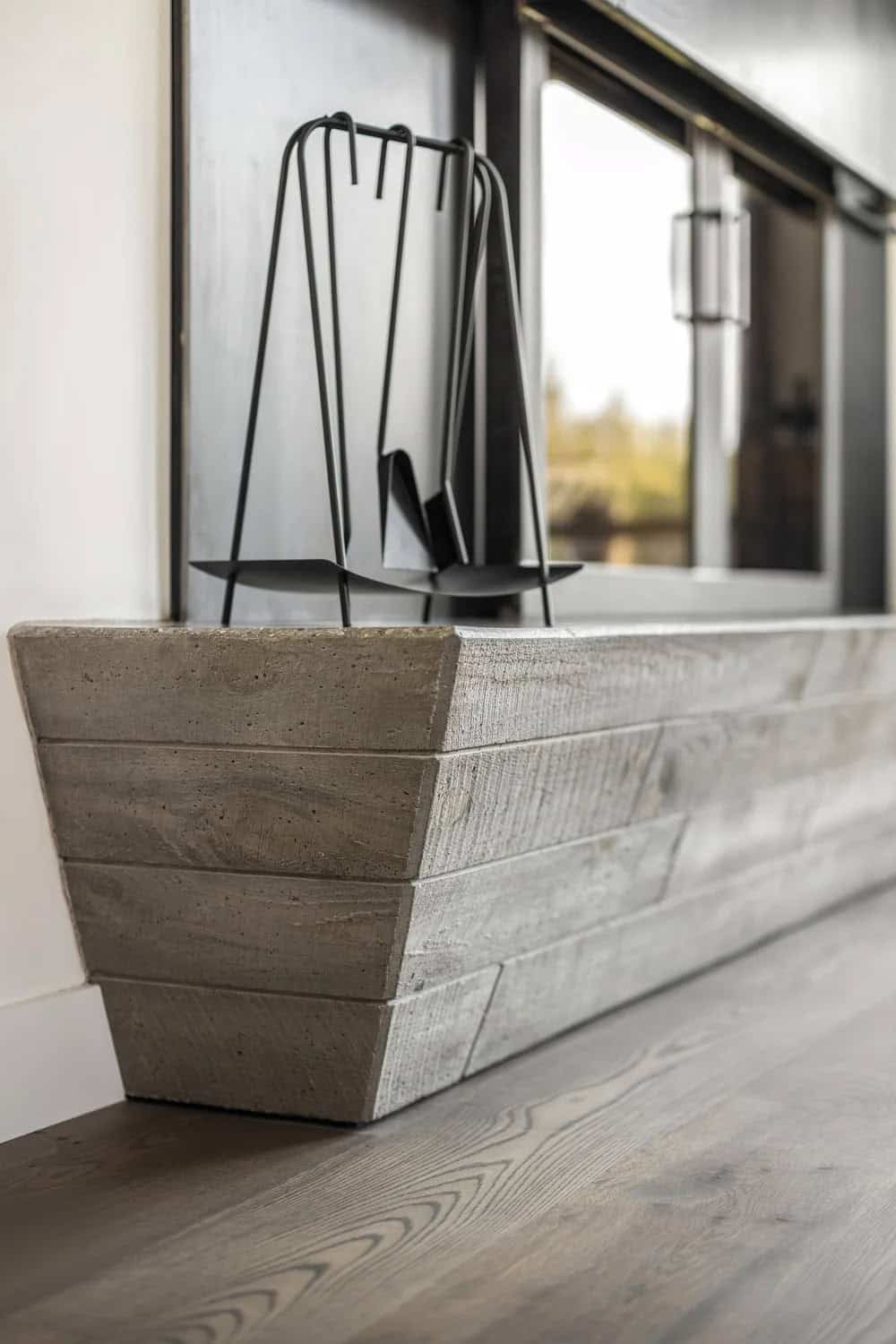 modern living room with a double sided fireplace detail