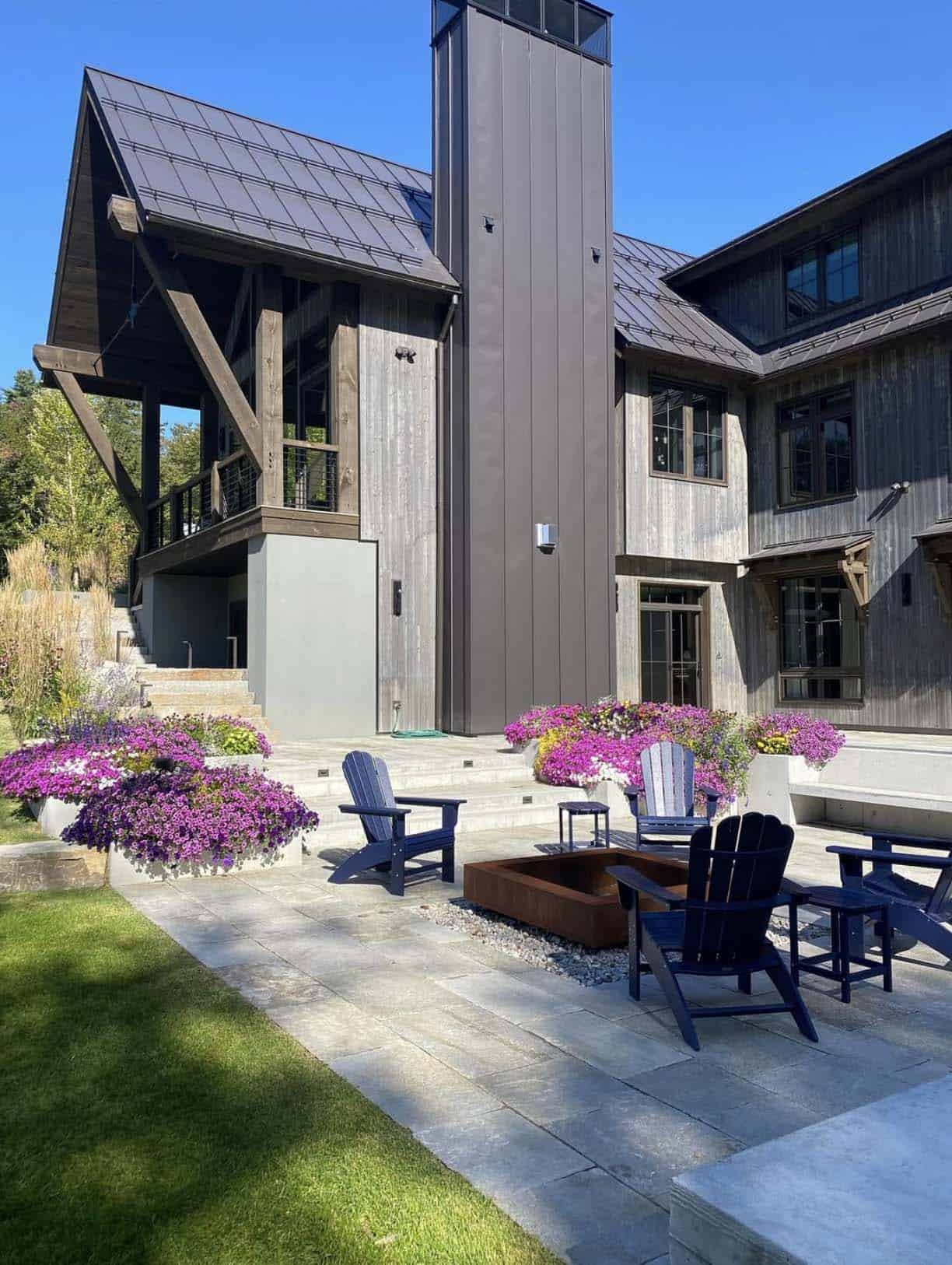 mountain ski home exterior with a patio and outdoor furniture