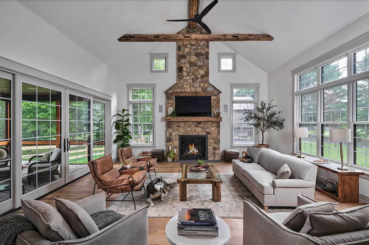 farmhouse style living room with a fireplace