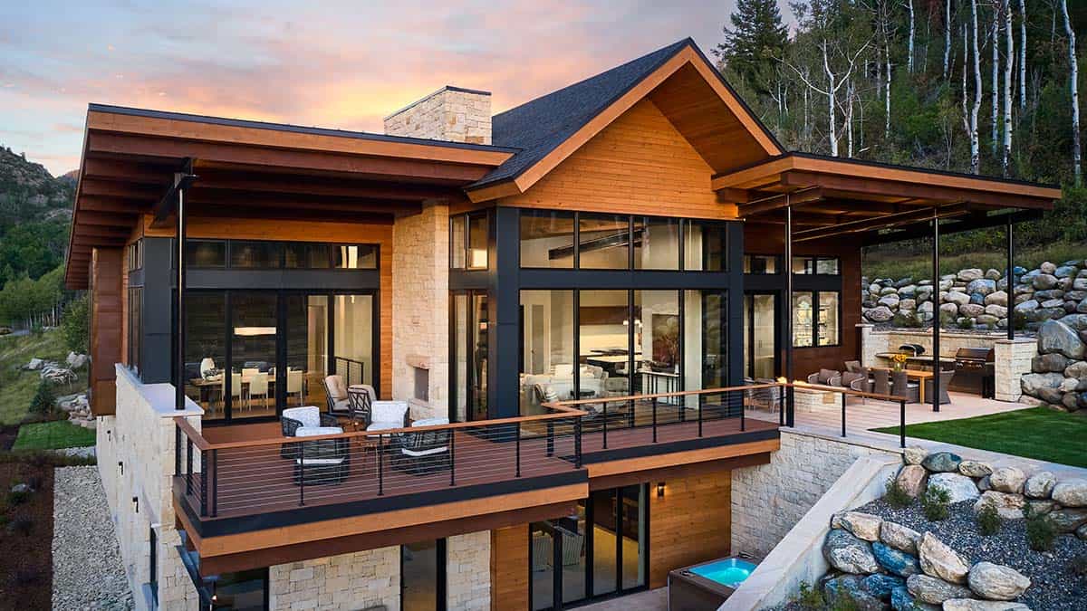 modern mountain home exterior backyard view
