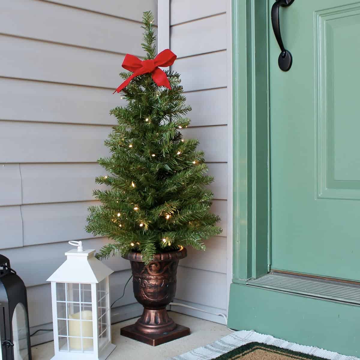 mini christmas tree at the front door