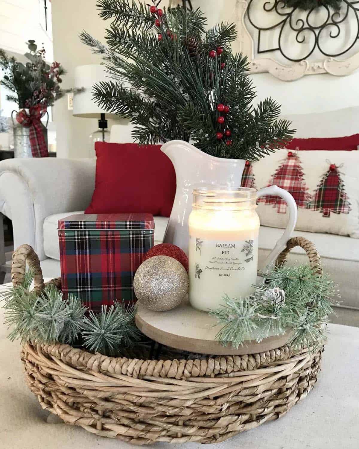 christmas decorated centerpiece on a coffee table
