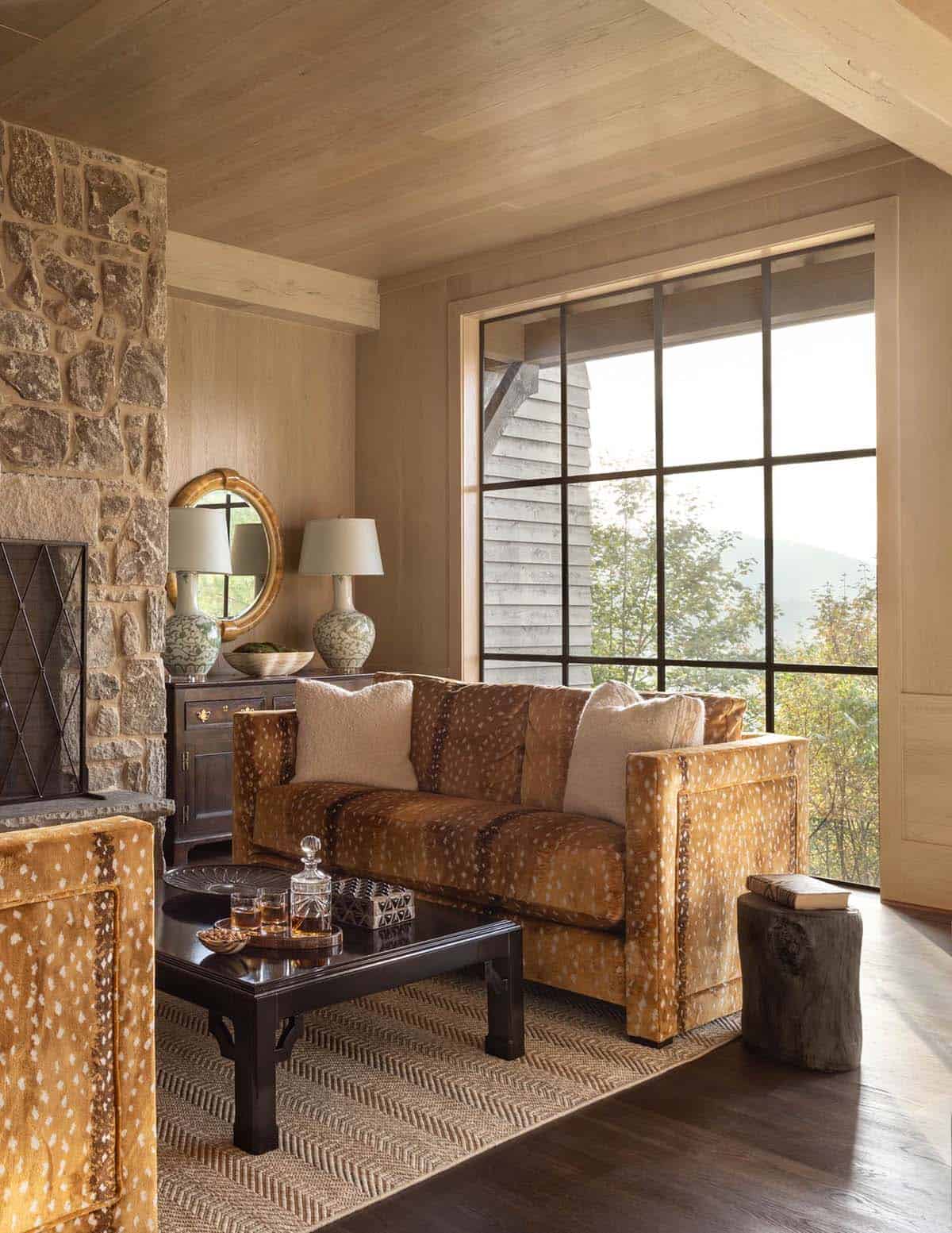 refined rustic family room with a fireplace