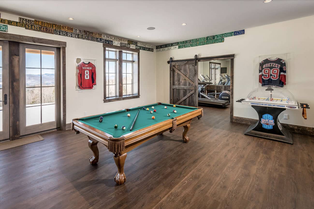 modern game room with a pool table