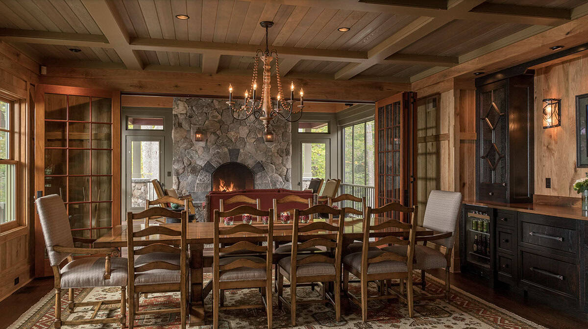 rustic dining room with a fireplace