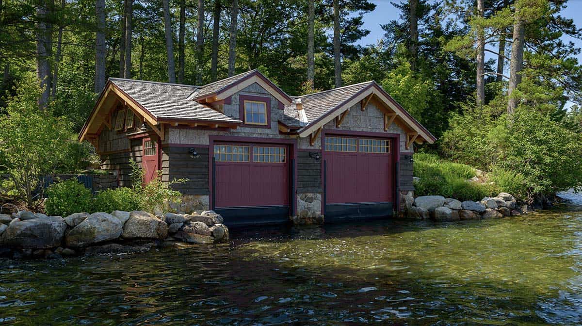 rustic boat house exterior with a water view
