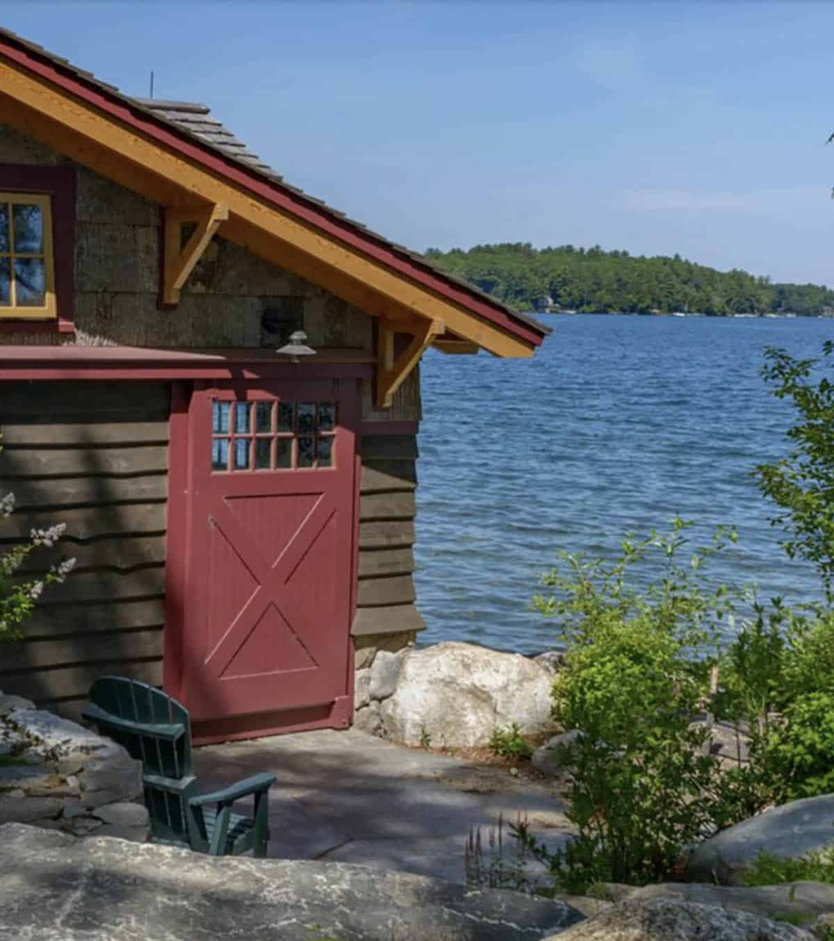 rustic boat house exterior with a water view
