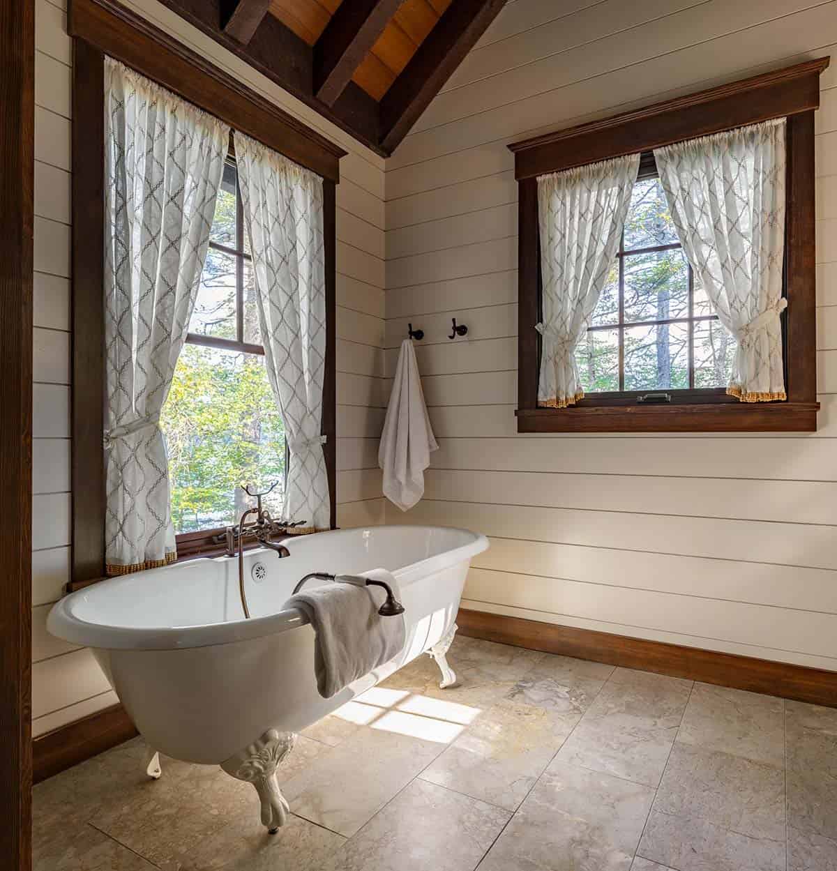 modern rustic bathroom with a freestanding tub
