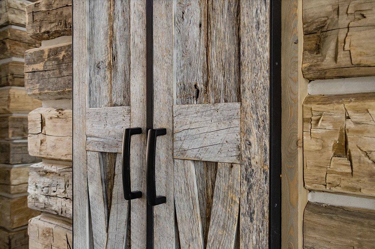 rustic hallway with wooden doors