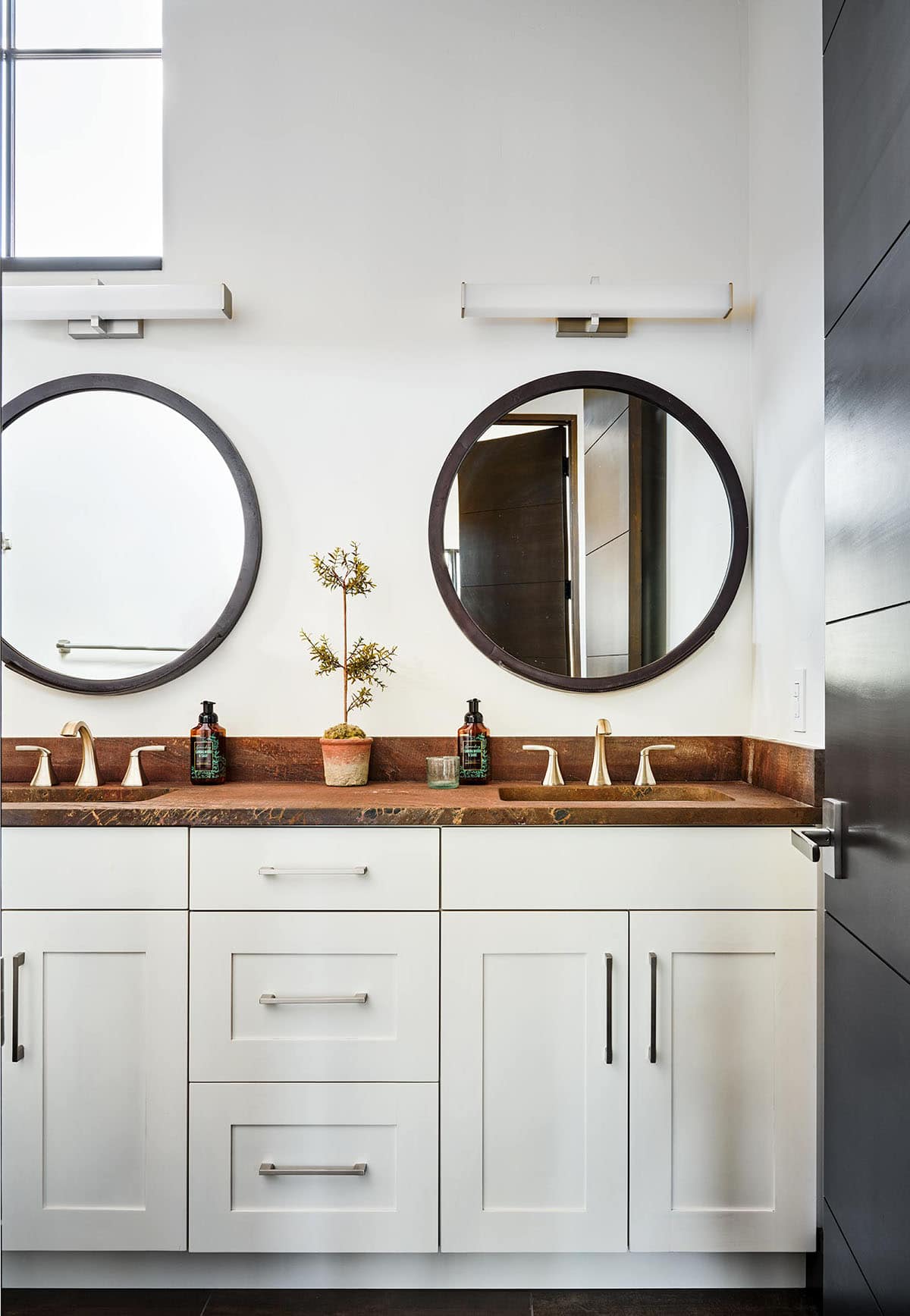 modern rustic bathroom vanity with round mirrors