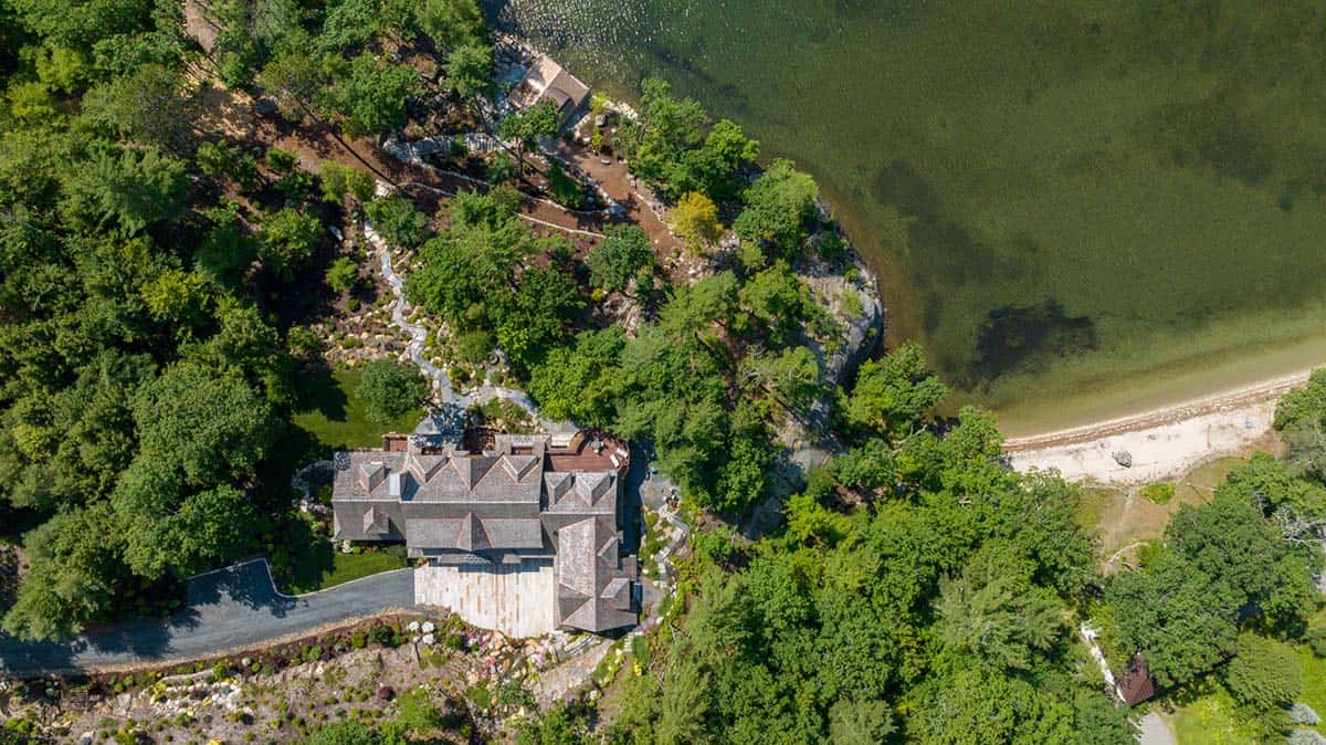 traditiional lake house exterior aerial view