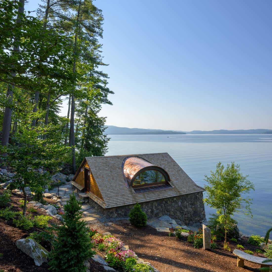 traditiional lake house exterior boat house