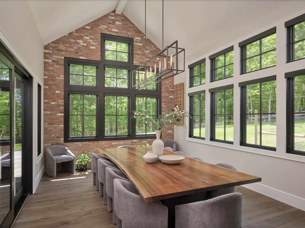 rustic modern dining room with a brick accent wall