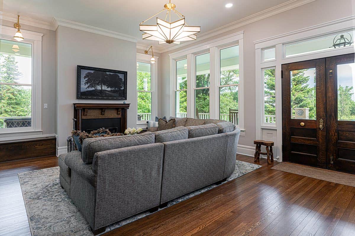 farmhouse style living room with a fireplace