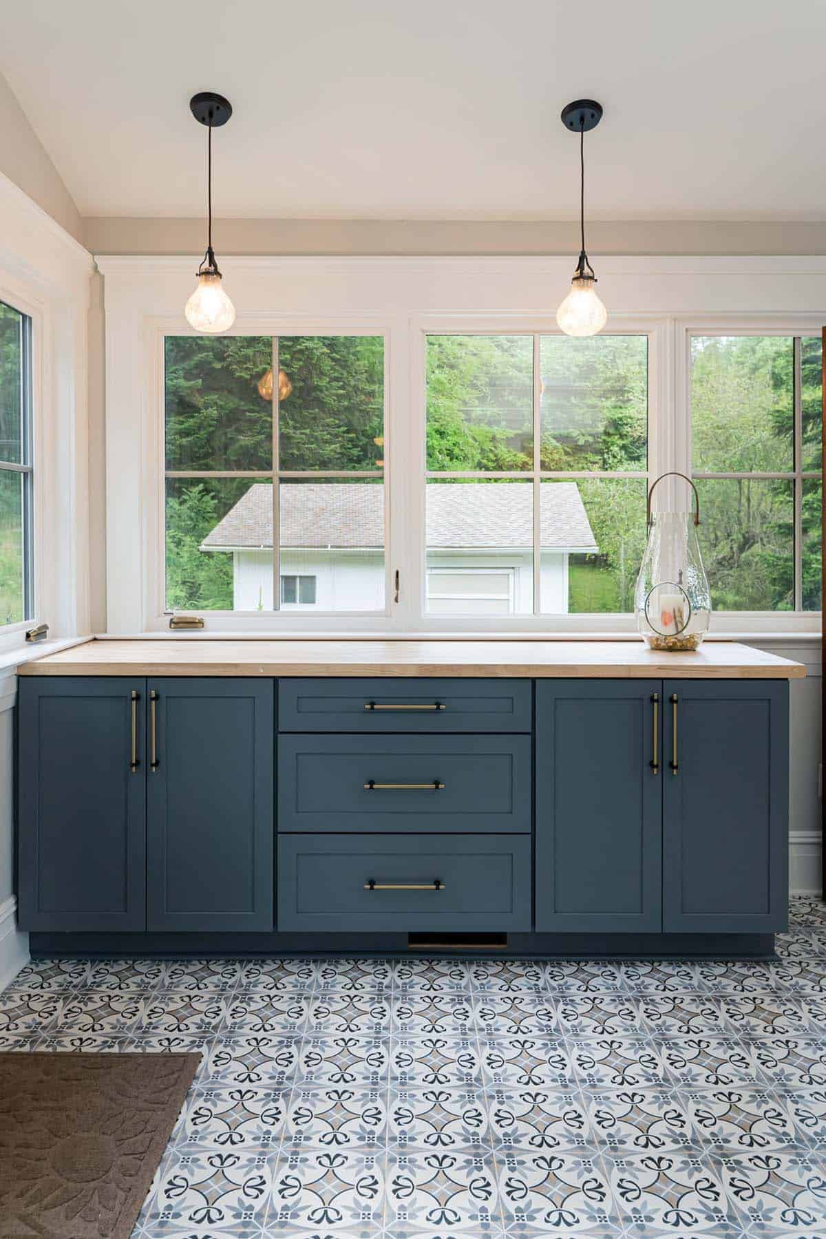 farmhouse style mudroom cabinets with a window