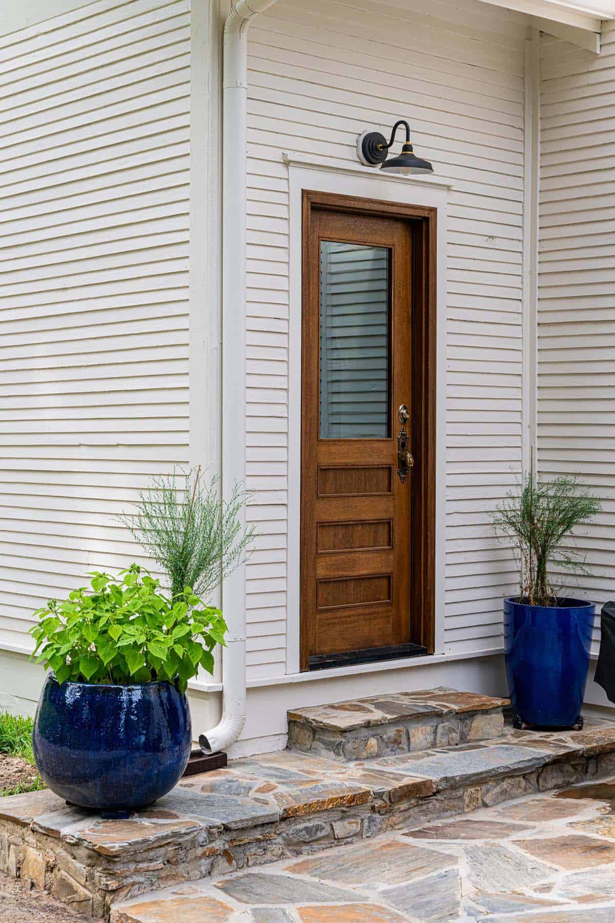 alpine farmhouse exterior mudroom entry