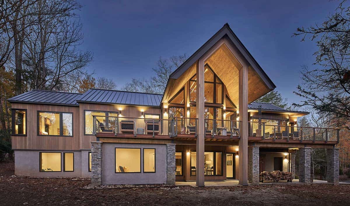 rustic modern mountain home exterior at dusk