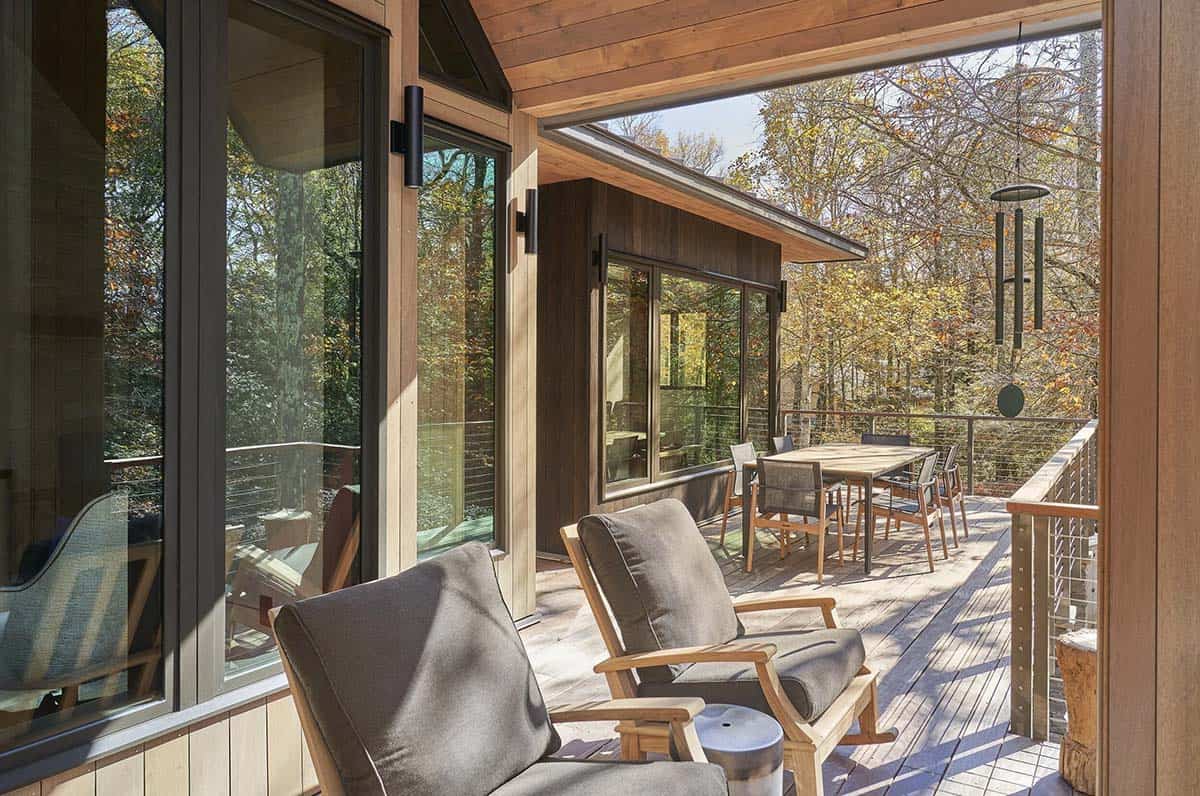 rustic modern covered porch with outdoor furniture