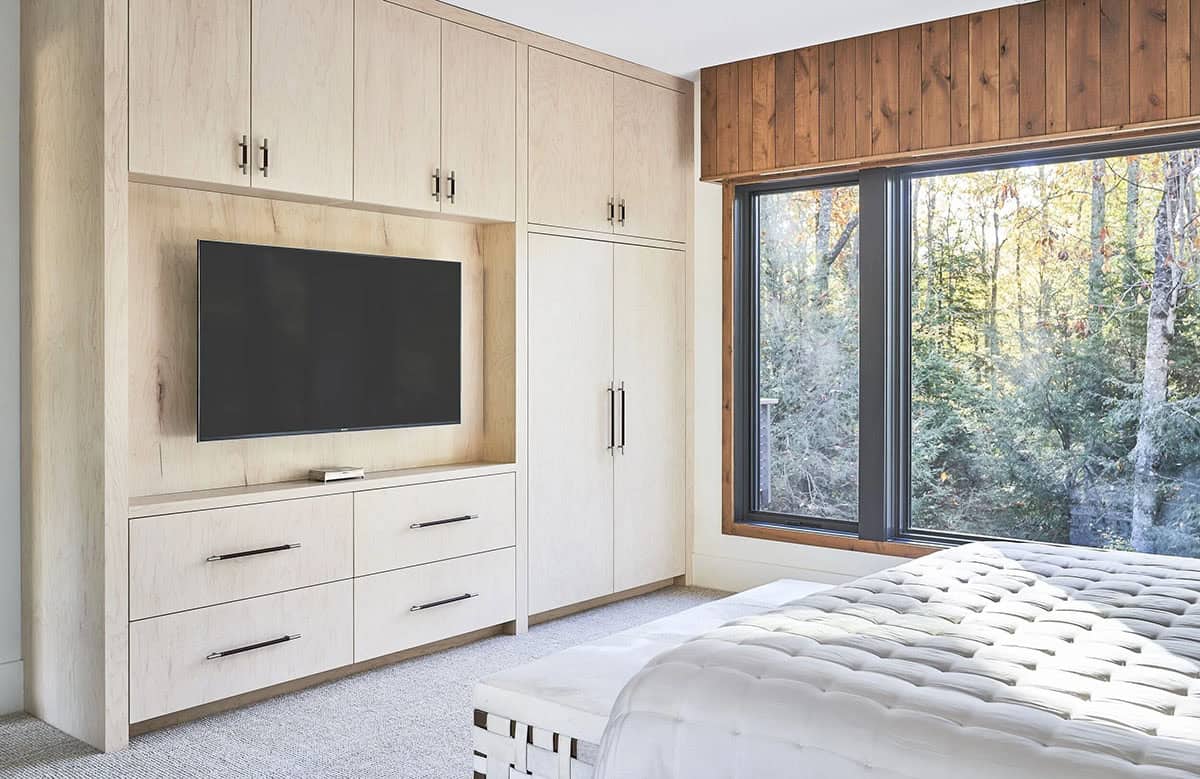 rustic modern bedroom with sliding glass doors