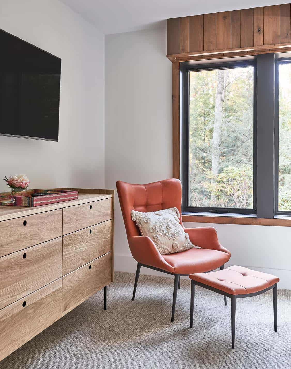 rustic modern bedroom with a reading chair