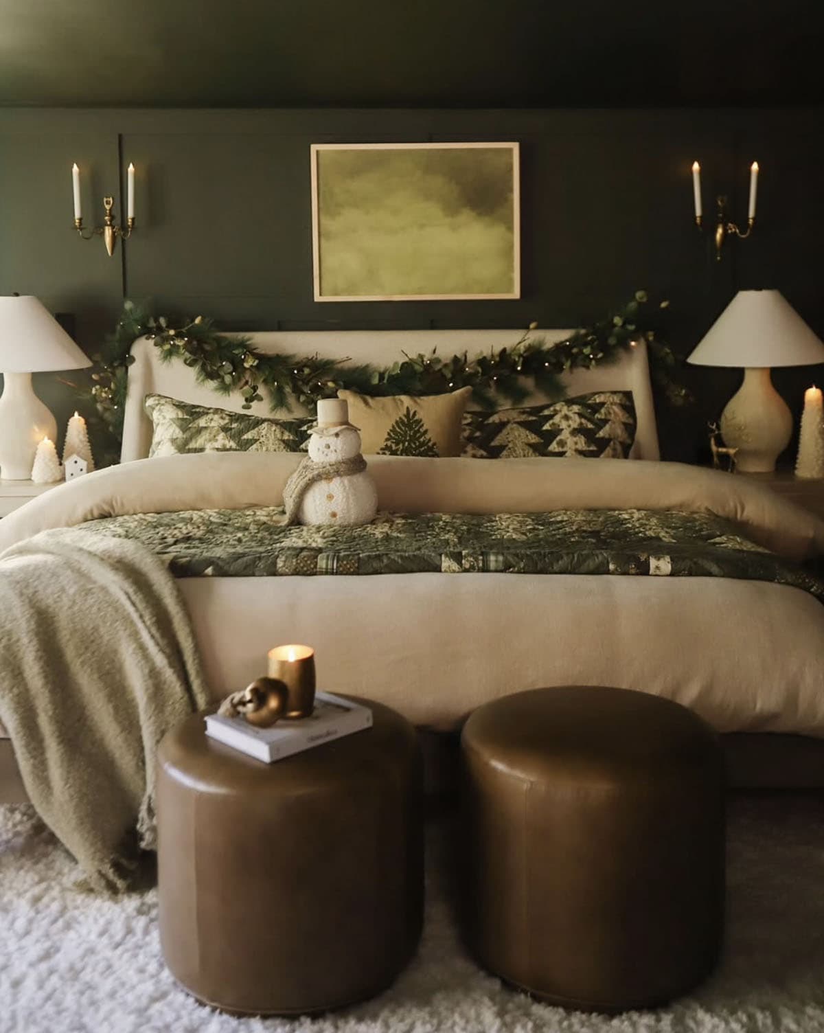 cozy christmas bedroom decor with layers of bedding and garland