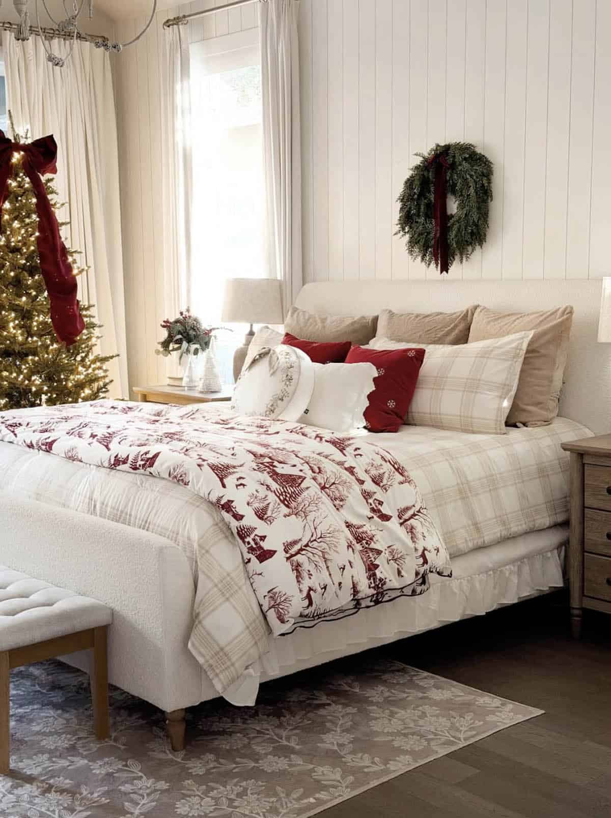 cozy christmas bedroom decor with a wreath and tree