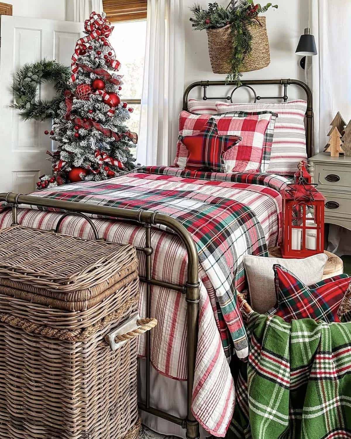 cozy christmas bedroom decor with layers of bedding and a tree