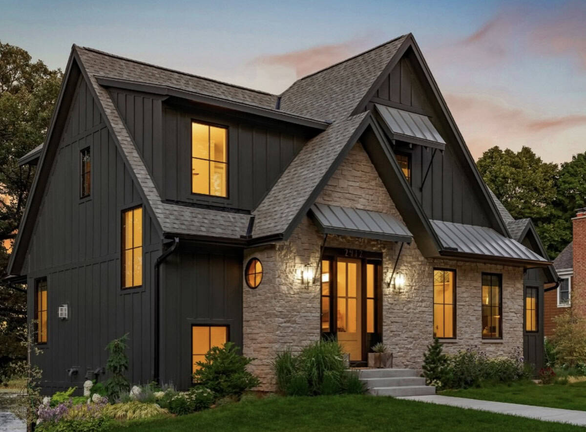 contemporary lake house exterior at dusk