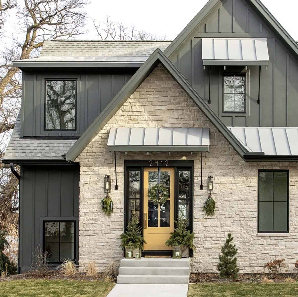 contemporary lake house exterior decorated for christmas