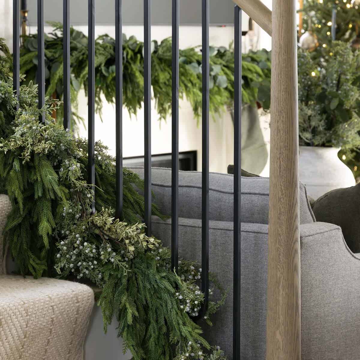 contemporary staircase decorated for christmas