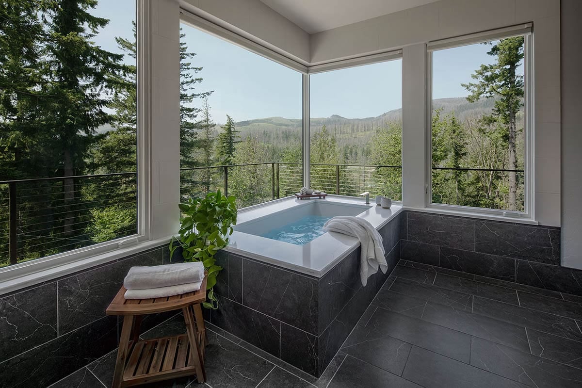 craftsman style bathroom with expansive windows