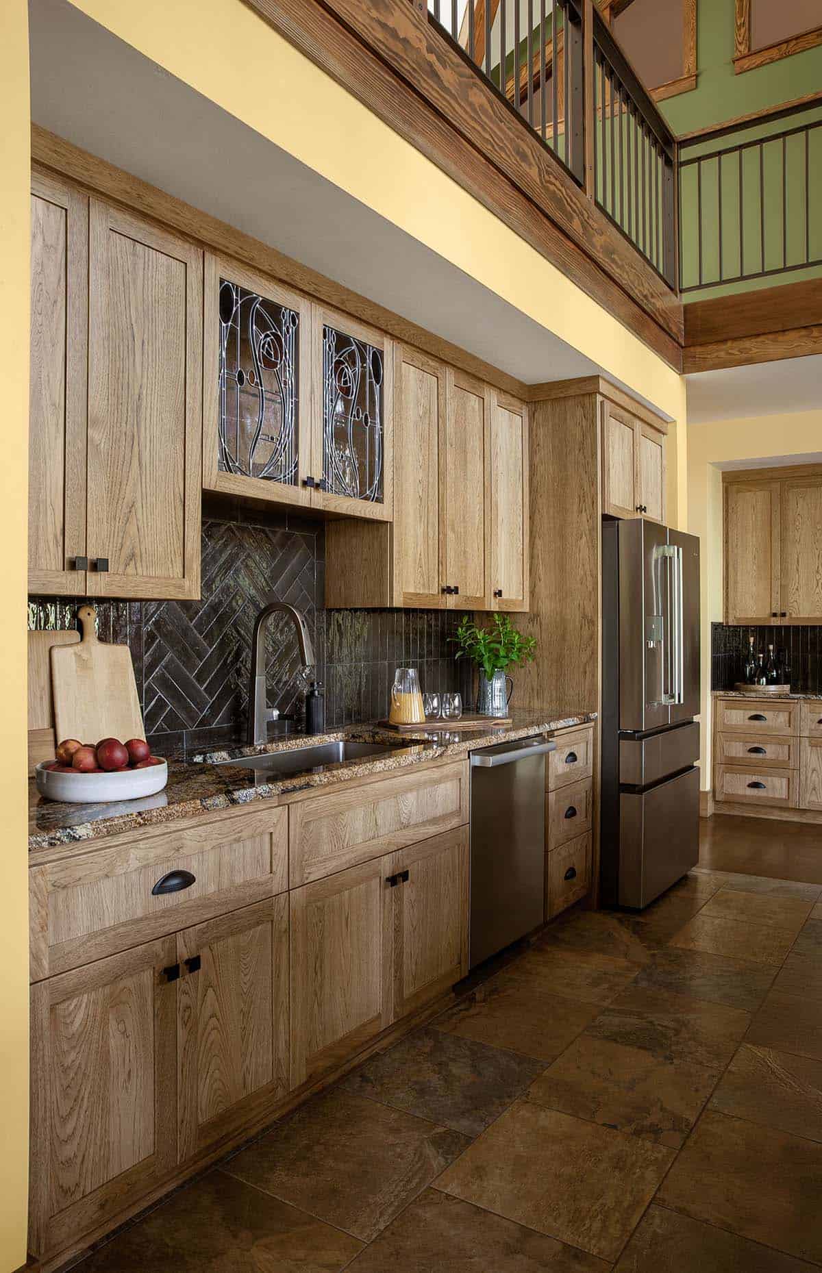 craftsman style kitchen with custom cabinetry in heart hickor