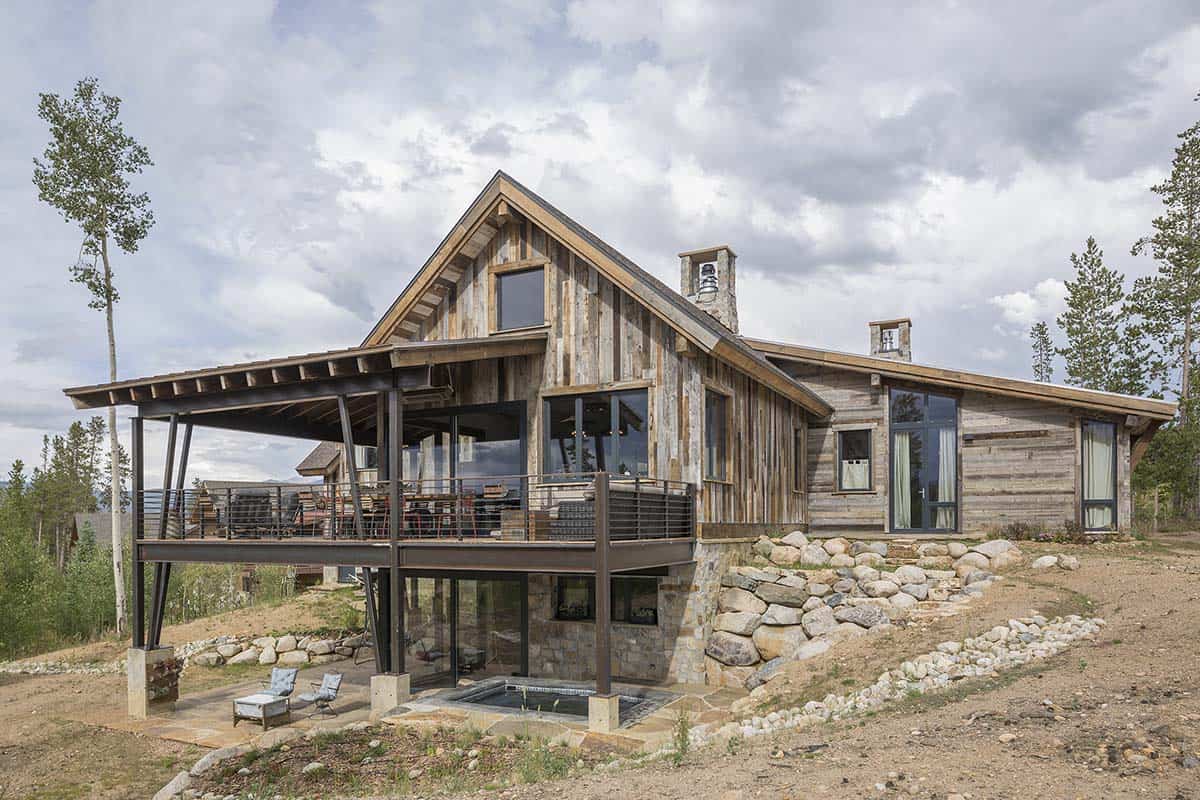 rustic mountain house exterior backyard view