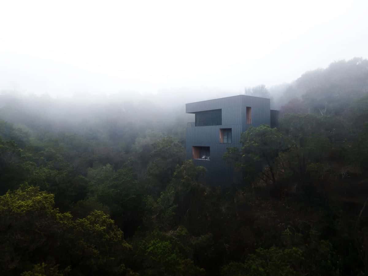 modern home exterior with fog
