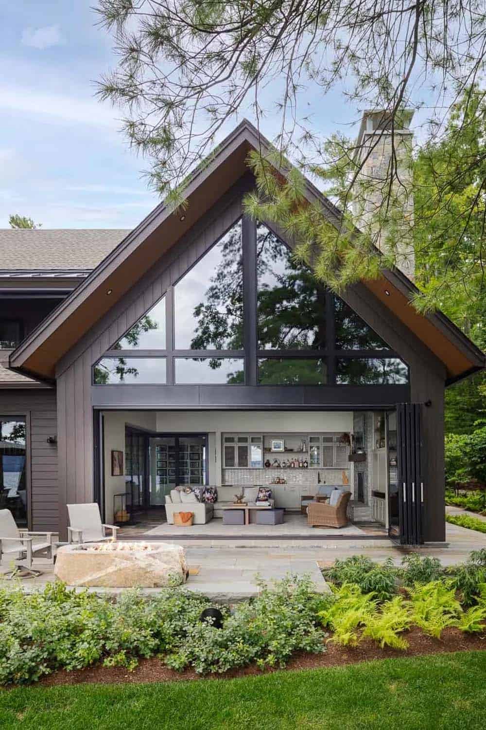 lake house exterior with a fire pit