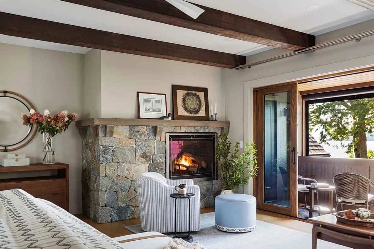 contemporary bedroom with a fireplace