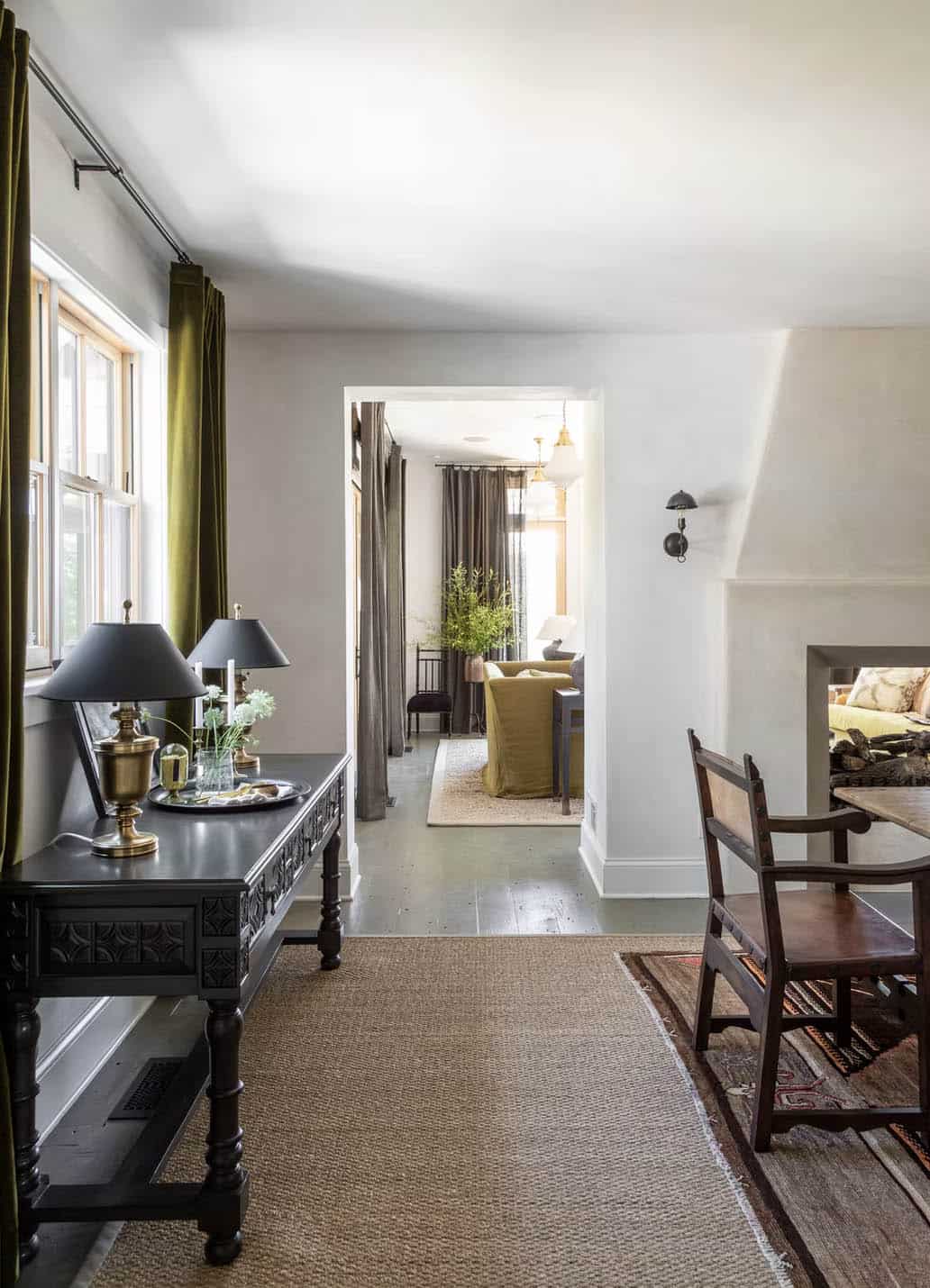 farmhouse dining room with a dual-sided fireplace