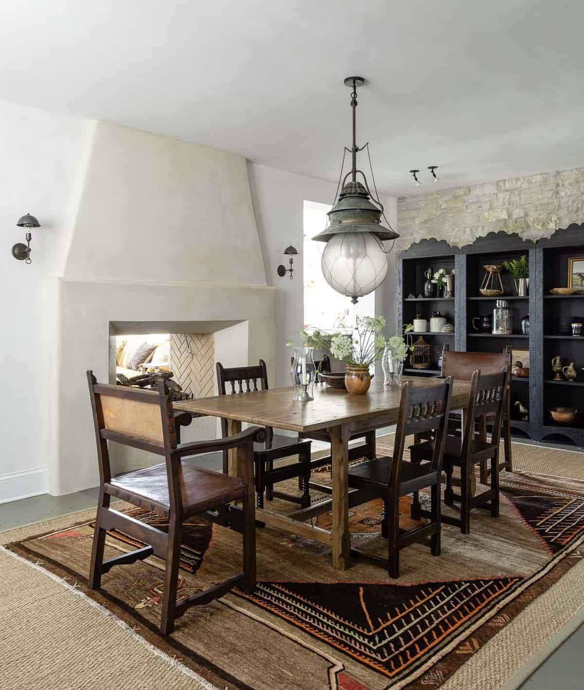 farmhouse dining room with a dual-sided fireplace