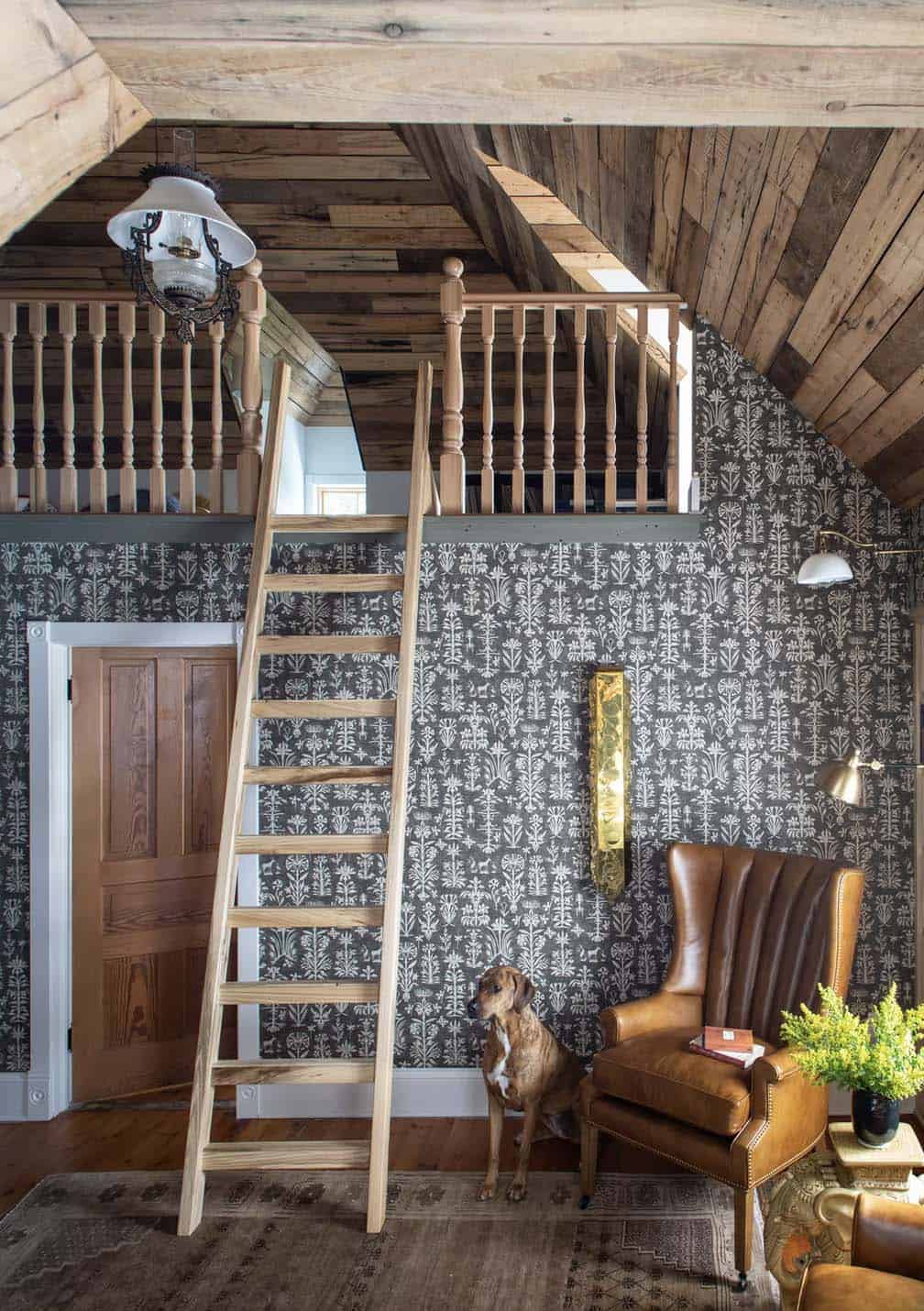 farmhouse home library with a ladder up to a lofted kid's play space
