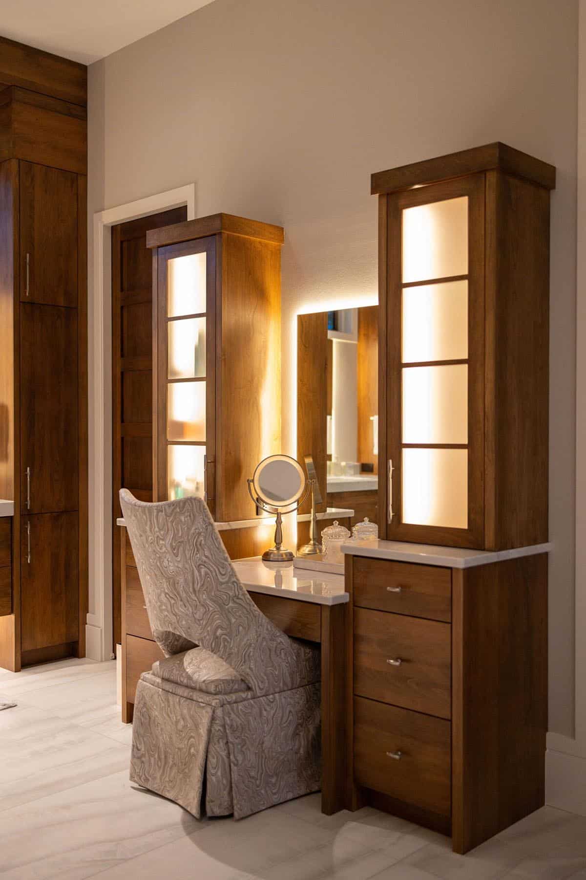 contemporary bathroom makeup vanity at dusk